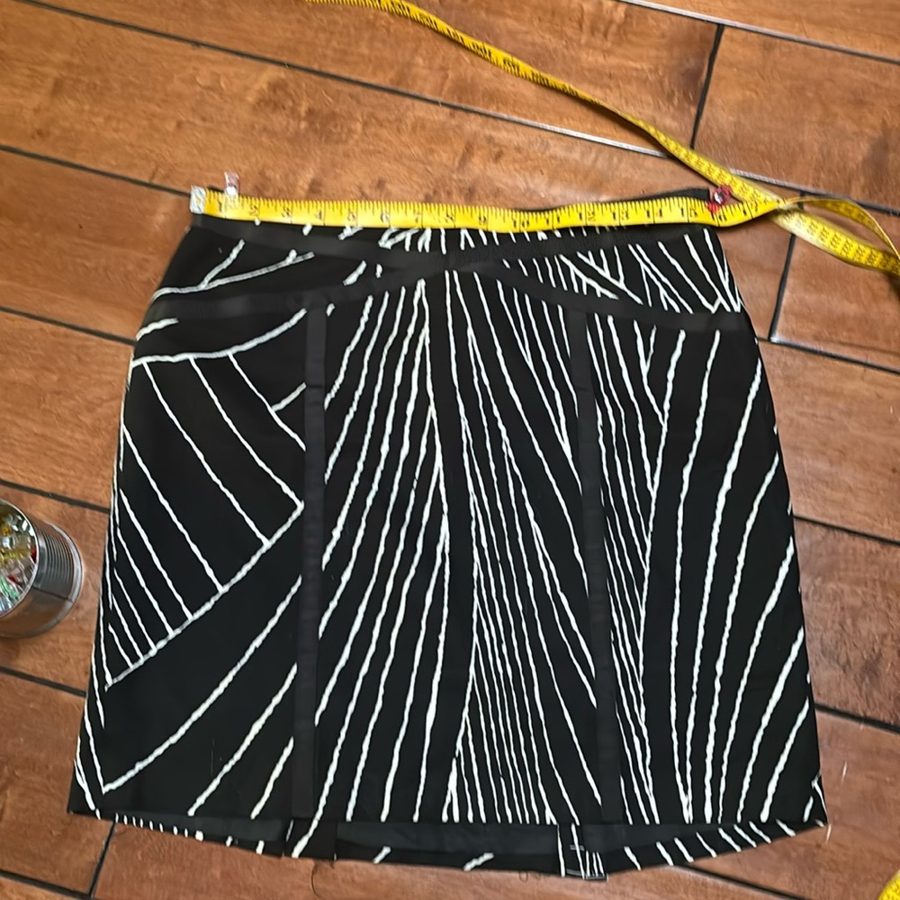 And Taylor side zip up mini skirt parrot with a black blazer